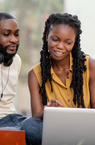 students with laptop